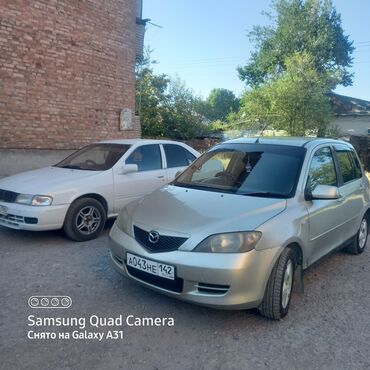 обмен на авто с доплатой: Mazda Demio: 2003 г., 1.4 л, Автомат, Бензин, Седан