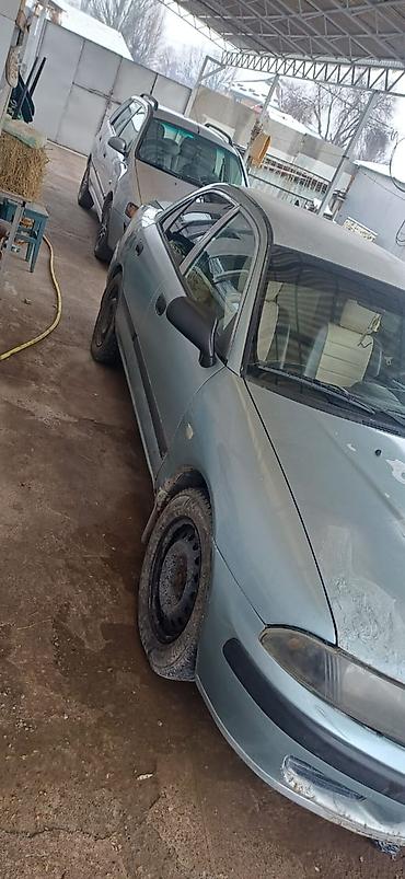 Mitsubishi: Mitsubishi Carisma: 2003 г., 1.3 л, Механика, Бензин, Седан — 3