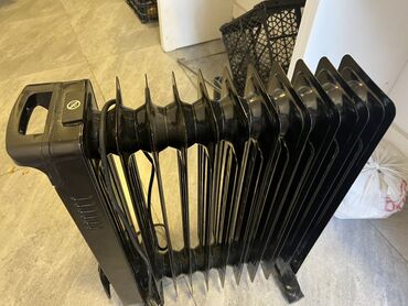 qizdirici konvektor: Bu, qızdırıcı, qara rəngli radiatordur. Yerdə hərəkət etmək üçün