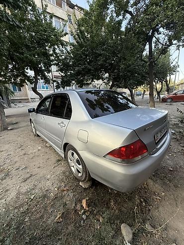 highlander platinum: Mitsubishi Lancer: 2003 г., 1.6 л, Механика, Бензин, Седан — 5