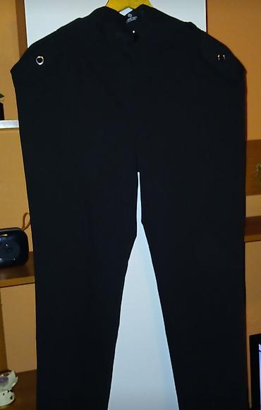 Donji deo: Ženske trenerke i haljina – set različitih komada 1) Crne sportske — 8