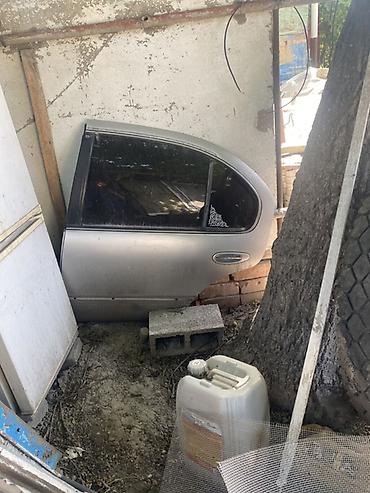 капот машины: Дверь Задняя левая Nissan, Б/у — 1