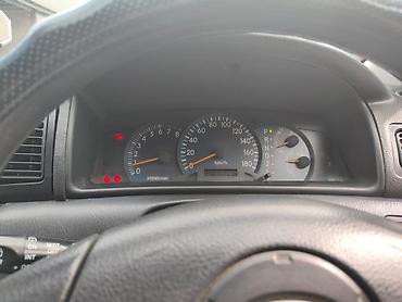 245 70 19 5: Toyota Corolla: 2004 г., 1.5 л, Автомат, Бензин, Хэтчбэк — 9