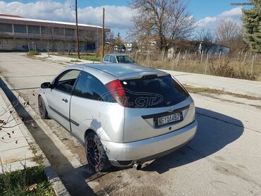 Transport: Ford Focus: 1.4 l | 2000 year | 338000 km. Coupe/Sports