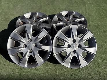 диски на golf 4 r15: Литые Диски R 15 Комплект, отверстий - 4, Б/у — 1