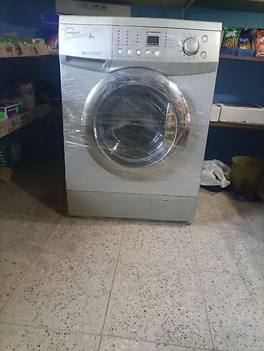 daewoo paltaryuyan: Daewoo avtomatik paltaryuyan maşın - Ön yükləməli model - Yükləmə — 1