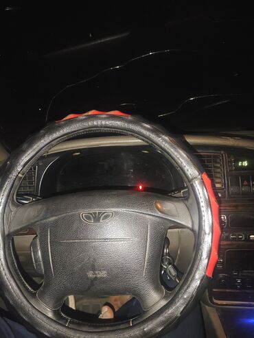 дево матис: Автомобиль Daewoo Nубира белого цвета с кузовом седан. Оснащен