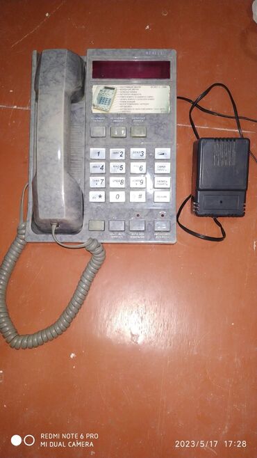 işlemiş telefonlar: Stasionar telefon Simli