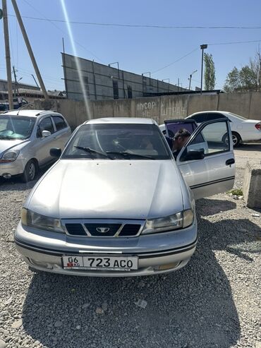 машина некса: Daewoo Nexia, серебристый седан 4 двери. Основные характеристики по