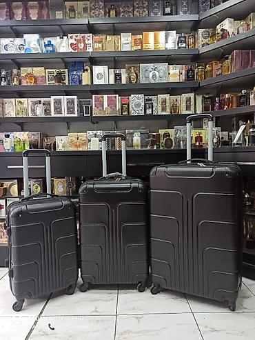 Çamadanlar: Səyahət üçün sərt korpuslu çamadan dəsti - Rəng: qara - Ölçülər: 3-lü — 1