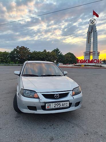 корай 5: Mazda 323: 2003 г., 1.6 л, Механика, Бензин, Универсал — 1