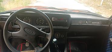 опель зафира а: VAZ 2104, qırmızı rəng, universal kuzov. Xüsusiyyətlər: - Arxa — 5