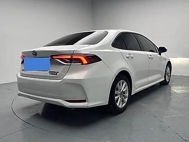 coroll: Toyota Corolla: 2023 г., 1.8 л, Гибрид — 5