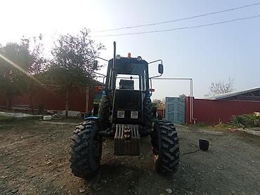 Traktorlar: Belarus MTZ traktoru - Güclü dizel mühərrik, qabaqda balans yükləri — 10