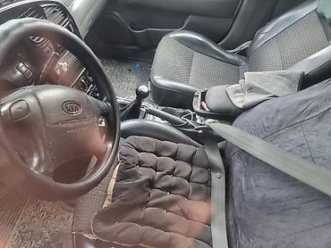 range over: Kia Spectra: 2002 г., Механика, Бензин, Седан — 1