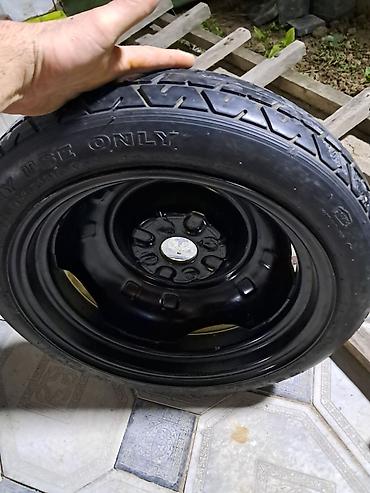 sinler ve diskler type 1: Avtomobil üçün ehtiyat “donut” tipli təkər və dəmir disk komplekti — 1