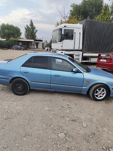 фаркоп мазда 626: Mazda 626: 1996 г., 2 л, Механика, Бензин, Седан — 4