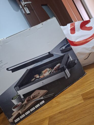 коптильный аппарат: Məhsul: WMF Kontaktgrill (elektrik masaüstü qril) Xüsusiyyətlər: -
