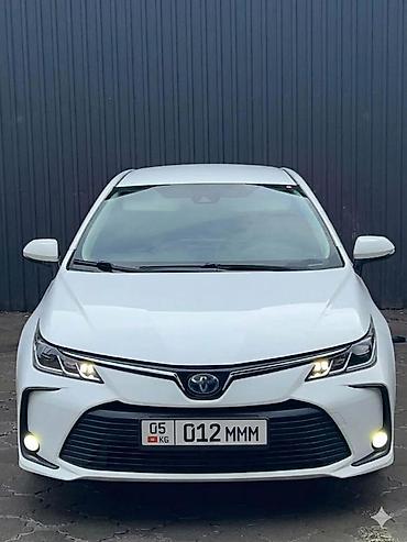 byd e6: Toyota Corolla: 2019 г., 1.8 л, Вариатор, Гибрид, Седан — 2
