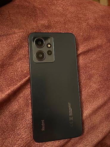 tecno pop 7: Redmi smartfon - Model: Redmi (arka paneldə “Redmi” loqosu) - Rəng — 1
