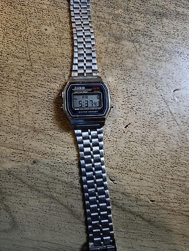 elektron saat: Casio 593A159w seriyası üslubunda klassik rəqəmsal qol saatı - — 1