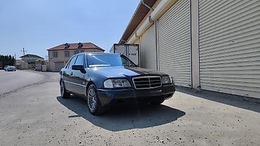 spoiler satisi: Mercedes-Benz C 200: 2 l | 1995 il Sedan — 1