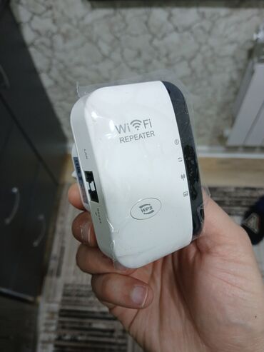 Modemlər və şəbəkə avadanlıqları: Wifi guclendirici eger sizde diger yerler internet tutmursa bu