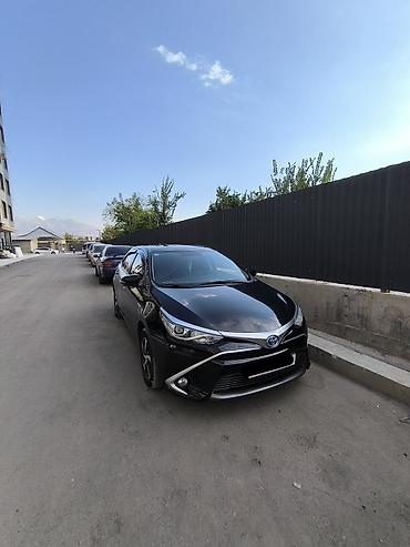 Toyota Corolla: 2019 г., 1.8 л, Автомат, Гибрид, Седан