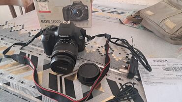Fotokameralar: Canon EOS 1300D DSLR fotoaparat dəsti Xüsusiyyətlər: - Korpus: Canon — 1