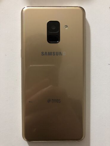 Samsung: Samsung Galaxy A8 2018, 64 GB, rəng - Sarı, Barmaq izi, İki sim kartlı, Face ID