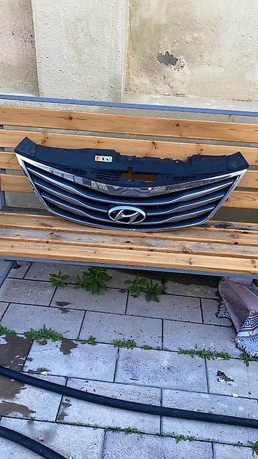 ev radiyatoru: Hyundai üçün orijinal ön radiator barmaqlığı (emblemlə). - Model — 1