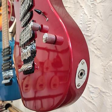 gitara tarnada: Elektro-gitara Smiger S-G5 Simlərin sayı: 6 Üst: Cökə ağacı Qol — 3