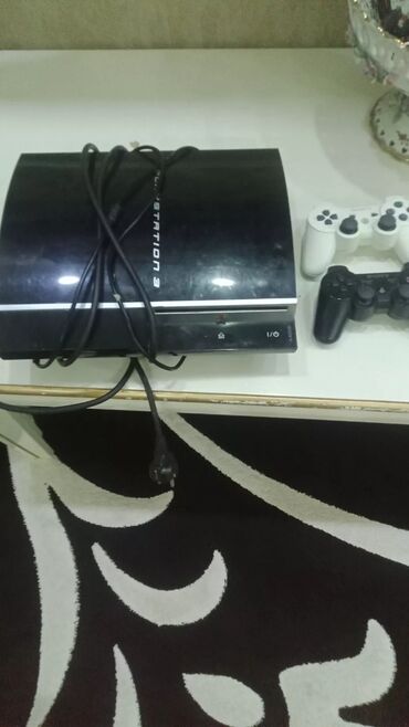 PS3 (Sony PlayStation 3): PS 3satilir 2eded pult arginal yadaw 312 içinde 28oyun var . tam