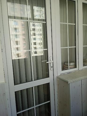 ağ qapı: Qapı pəncərə.Təzədir.Ölcü eni 1.85 hündürlüyü 2.15.Ünvan — 1