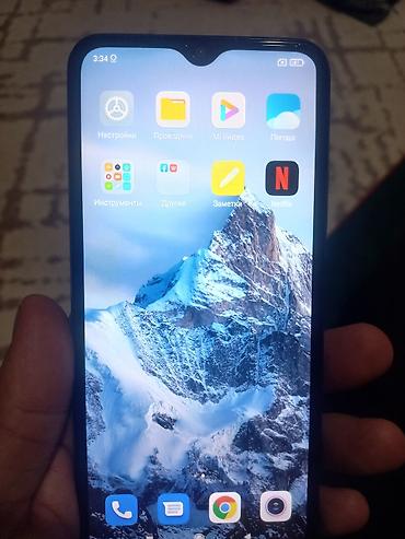 mi: Смартфон Xiaomi с большим экраном и каплевидным вырезом под — 2