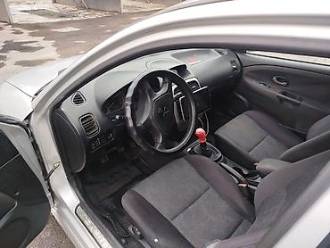 maserati купить: Mitsubishi Carisma: 2004 г., 1.6 л, Механика, Бензин, Лифтбек — 4
