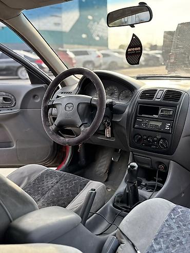 Mazda: Mazda 323: 1998 г., 1.5 л, Механика, Бензин, Универсал — 14