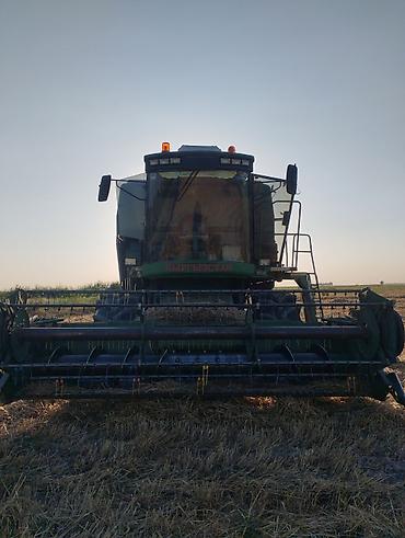 арык бетонный: Комбайн John Deere с жатками Описание: - Зерноуборочный комбайн John — 8