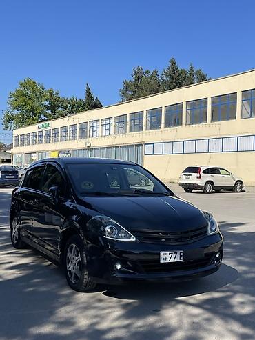 volkswagen tiguan 150 л с: Nissan Tiida: 1.5 л | 2011 г. Хэтчбэк — 9