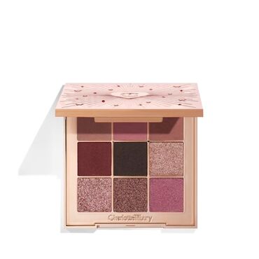сумку для косметики: Палетка теней для век от Charlotte Tilbury с девятью оттенками
