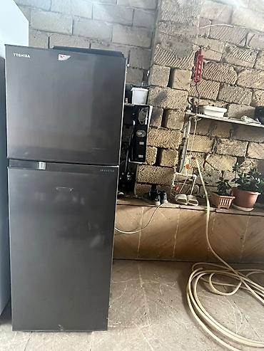 ucuz mini soyuducular: Toshiba iki qapılı soyuducu (üstdə dondurucu, altda soyuducu bölmə) - — 1