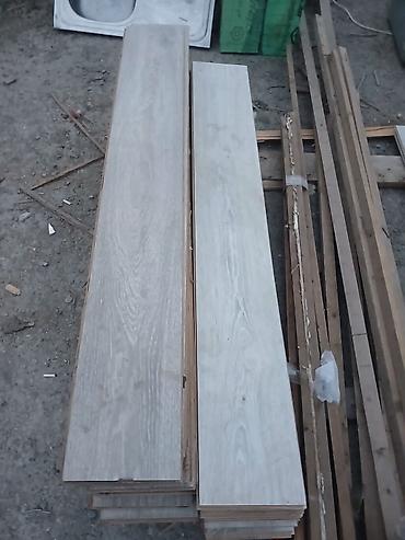 pol sixan: 1.səkildəki-74 İradə Laminat 2 rengli hersi 11 kvadratdi qiyməti 1kv — 1