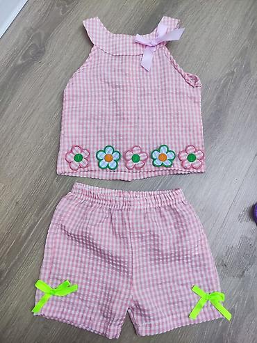 Koftalar, sviterlər: Her biri 4 azn — 14