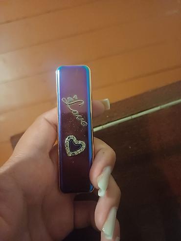 iqos iluma prime i: USB şarjlı elektrikli alışqan - Zərif dizayn: Ön hissədə “Love” — 2
