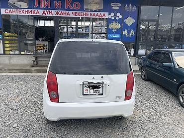 sonata 2 4: Mitsubishi Dingo: 2000 г., 1.5 л, Автомат, Бензин — 10