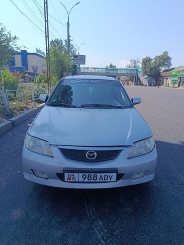 шины для машин: Mazda 323: 2002 г., 1.6 л, Механика, Бензин, Хэтчбэк