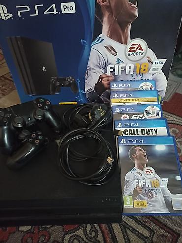 скупка ps: PlayStation 4 Pro (FIFA 18 Bundle) Комплектация: - Консоль Sony PS4 — 2