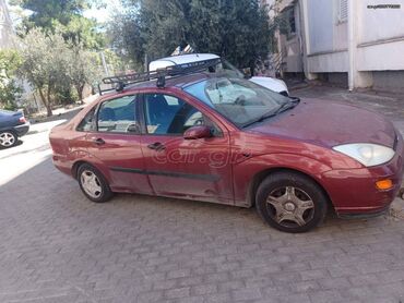 Transport: Ford Focus: 1.4 l | 2001 year | 270000 km. Limousine