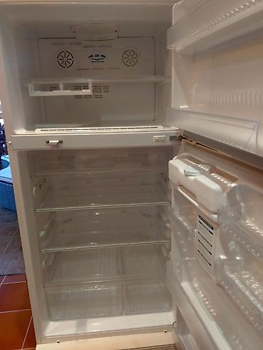 soyuducu xırdalan: Soyuducu 2 qapılı. Hazırda işlədilmir. Qaz vurulmalıdır. İçi təzə — 2