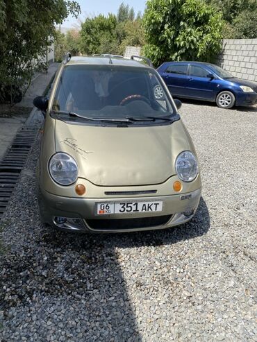 купить двигатель д 245: Автомобиль Daewoo Matiz в кузове хэтчбек. Золотистый цвет кузова